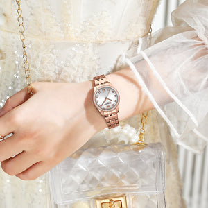 Curren Γυναικείο Ρολόι 9086 με Ροζ Χρυσό Μπρασελέ και Ασημένιο Καντράν