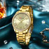 Curren Γυναικείο Ρολόι 9084 με Χρυσό Μπρασελέ και Χρυσό Καντράν